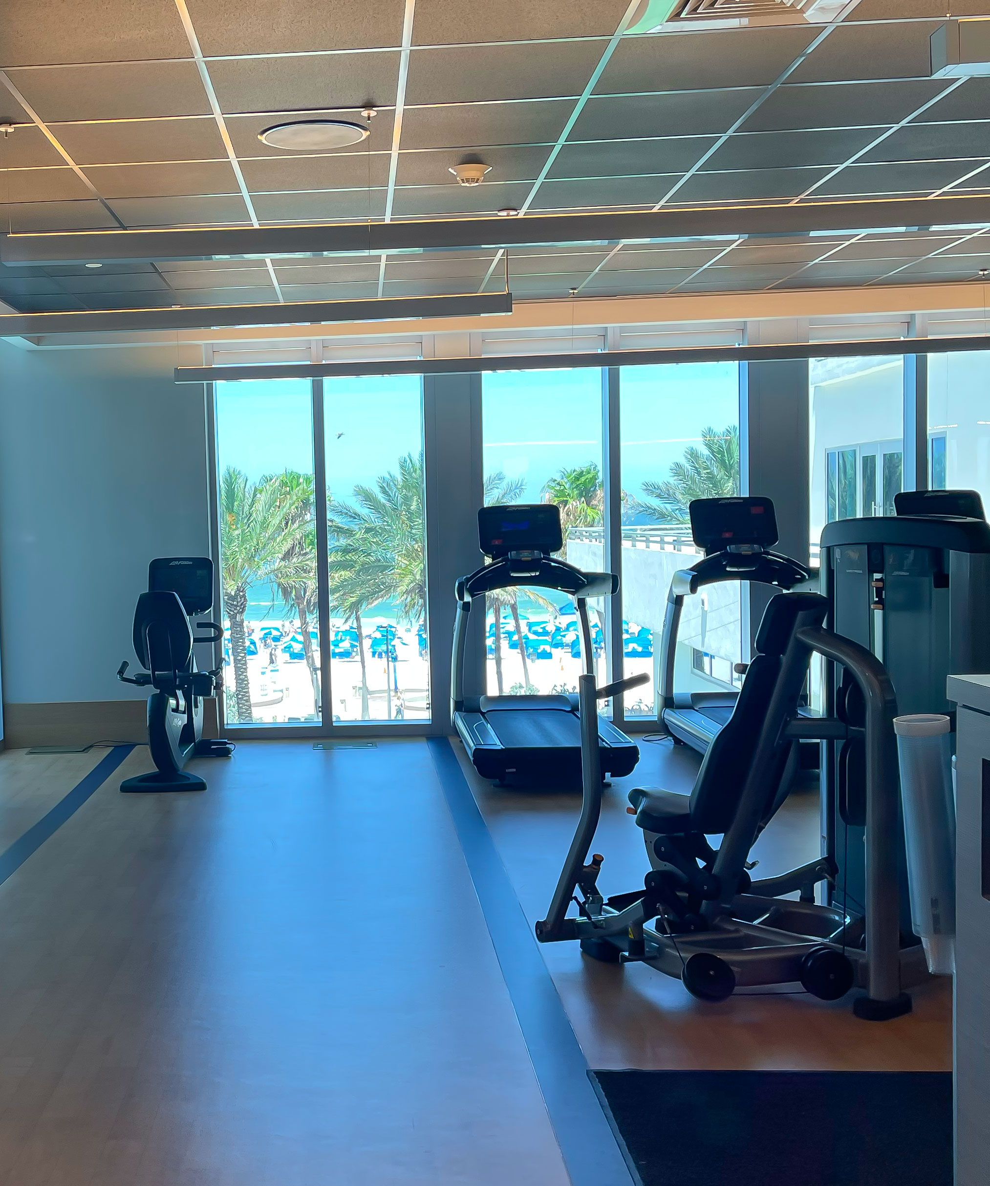 Wyndham Grand Clearwater Beach Gym with a view of the pool and clearwater beach.