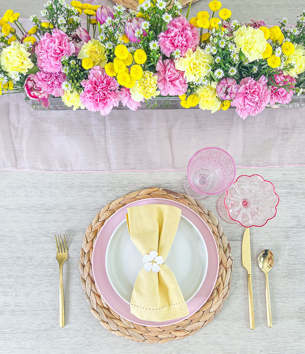 Florida lifestyle and home blogger Jill DiGioia shares an easy spring tablescape with yellow and pink decor.